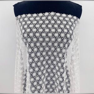 Ivory White Fabric with Geometric Broderie